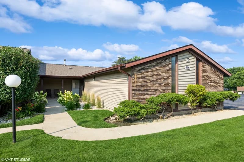 Single-family home on Devonshire Court in McHenry, IL — listed and sold by Stonebridge Realty.